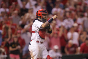 A Baseball Player Is Celebrating With His Team Wallpaper