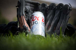 A Baseball Player Wearing A Leather Glove In Action Wallpaper