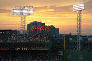 A Baseball Stadium With A Large Crowd Wallpaper