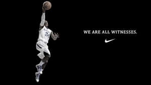 A Basketball Player Is Jumping Up And Down With The Words We Are All Witnesses Wallpaper