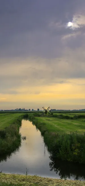 A Beach Landscape Of Rocky Cliffs And Crystal Blue Water. Wallpaper