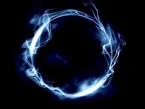A Beautiful Abstract Image Of Smoke In A Mesmerizing Blue Hue. Wallpaper
