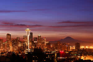 A Beautiful Aerial View Of Seattle, The Emerald City, From A Distance Wallpaper