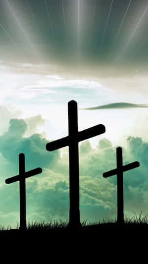 A Beautiful And Delicate Cross Amid Subtle Colors Wallpaper