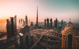 “a Beautiful Evening Of A Vibrant City, Dubai” Wallpaper