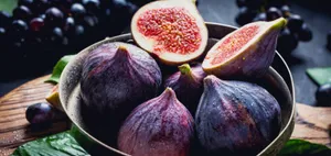 A Beautiful Field Of Vibrant Yellow And Purple Wildflowers. Wallpaper