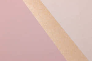 A Beautiful Golden And Light Pink Color Spectrum. Wallpaper