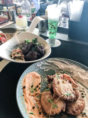 - A Beautiful Lake Surrounded By Lush Trees And Greenery Wallpaper