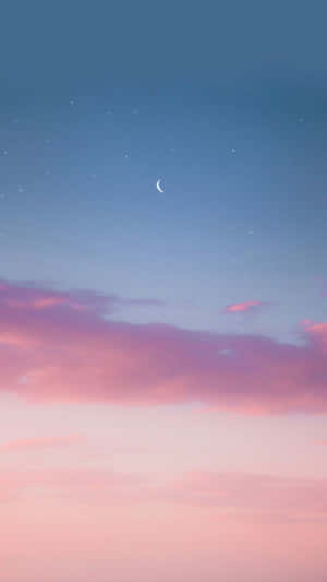 A Beautiful Landscape Of Pink And Blue Hues Wallpaper