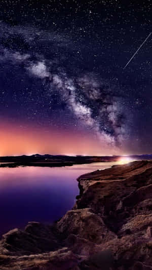 A Beautiful Night Sky Lit Up By The Sparkling Stars Wallpaper