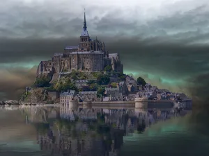 A Beautiful Nighttime Scene Of An Ornately Built Bridge Shimmering Across A Lake Wallpaper