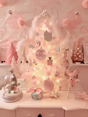 A Beautiful Pink Christmas Tree Brings Holiday Cheer To Any Home Wallpaper