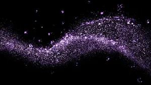 A Beautiful Purple Sparkle Effect Wallpaper