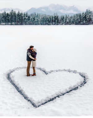 A Beautiful Snowy Landscape In Winter Wallpaper