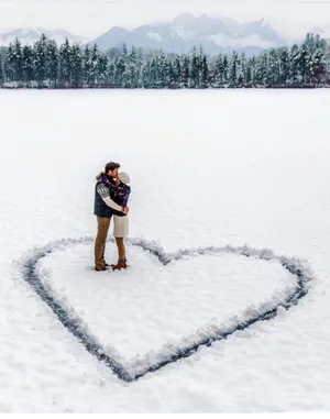 A Beautiful Snowy Landscape In Winter Wallpaper