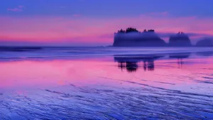 A Beautiful Sunset Of Calming Hues Of Blue And Purple Over The Horizon. Wallpaper