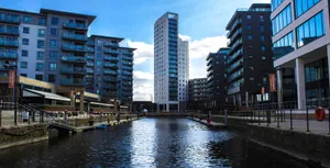 A Beautiful Sunset Over Leeds Cityscape Wallpaper