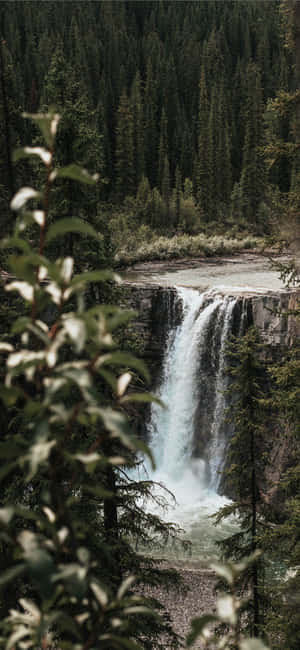 A Beautiful Waterfall View On An Iphone Wallpaper