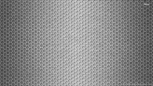 A Black And White Background With A Pattern Of Hexagons Wallpaper