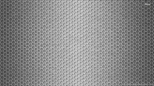 A Black And White Background With A Pattern Of Hexagons Wallpaper