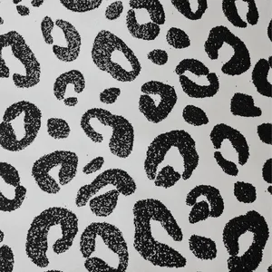 A Black And White Leopard Print Fabric Wallpaper