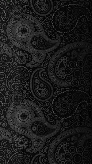 A Black And White Paisley Pattern On A Black Background Wallpaper