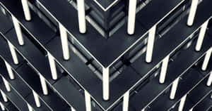 A Black And White Photo Of A Building With A Lot Of Lights Wallpaper