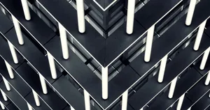 A Black And White Photo Of A Building With A Lot Of Lights Wallpaper