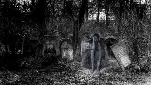 A Black And White Photo Of A Ghost In A Cemetery Wallpaper