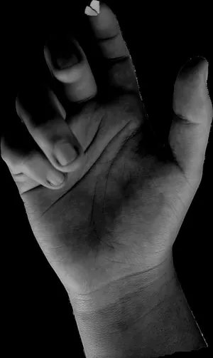A Black And White Photo Of A Hand Reaching Out Wallpaper