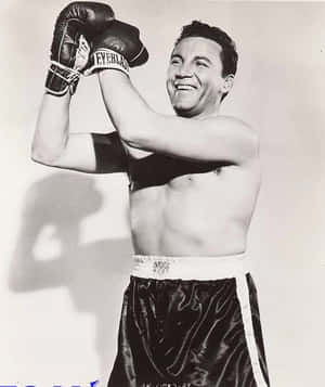 A Black And White Photo Of A Man With Boxing Gloves Wallpaper