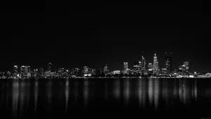 A Black And White Photo Of The City Skyline Wallpaper