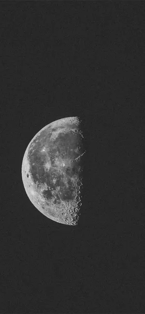 A Black And White Photo Of The Moon Wallpaper