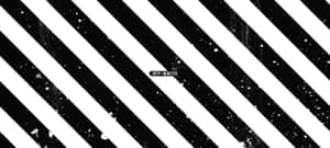 A Black And White Striped Background With A White Arrow Wallpaper