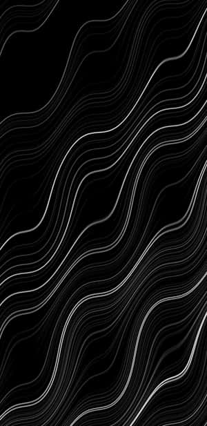 A Black And White Wavy Background Wallpaper