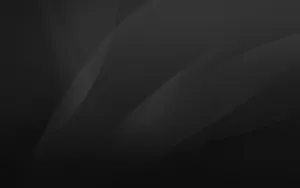 A Black Background With A Black Wavy Pattern Wallpaper