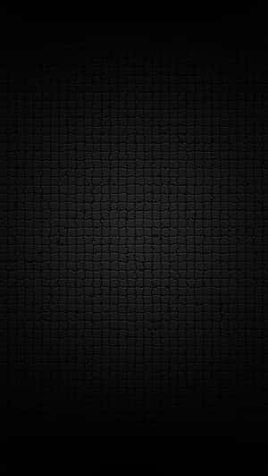 A Black Background With A Brick Pattern Wallpaper
