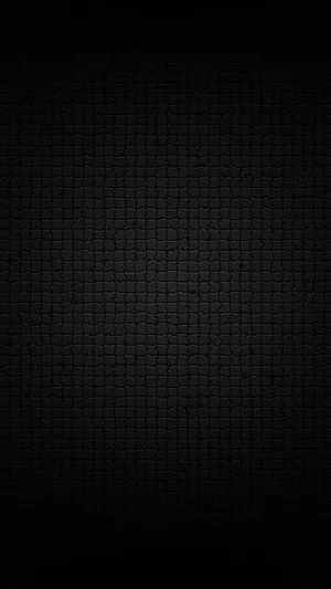 A Black Background With A Brick Pattern Wallpaper