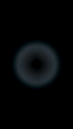 A Black Background With A Circular Pattern Wallpaper