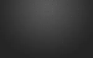 A Black Background With A Light Texture Wallpaper