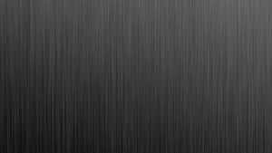 A Black Background With A Line Of Black Lines Wallpaper