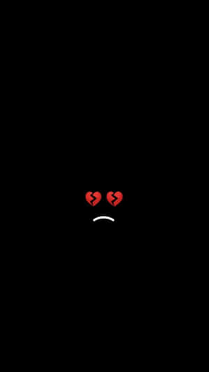 A Black Background With A Sad Face On It Wallpaper