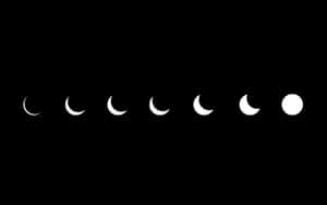 A Black Background With Different Phases Of The Moon Wallpaper