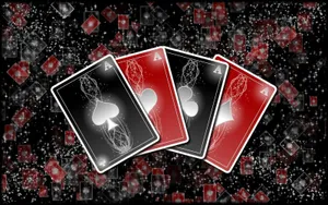A Black Background With Playing Cards On It Wallpaper