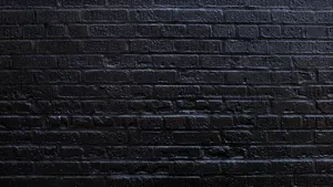 A Black Brick Wall Wallpaper
