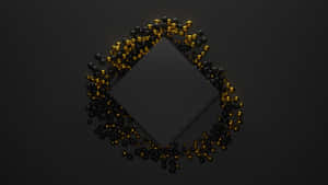 A Black Diamond With Gold Particles On It Wallpaper