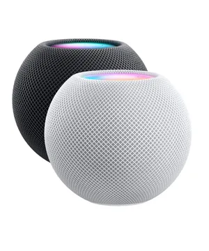 A Black Homepod On A Table Wallpaper