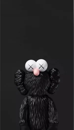 A Black Stuffed Animal With A Black Face Wallpaper