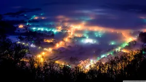 A Blissful Winter Night Beneath The Starlight Wallpaper