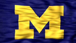 A Blue And Yellow Flag With The Letter M Wallpaper